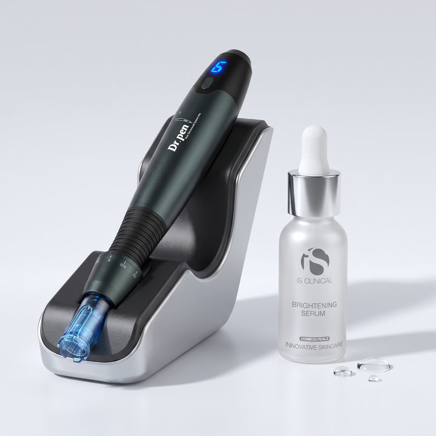 Dr. Pen A20 microneedling pen on its charging stand with iS Clinical Brightening Serum 15 ml